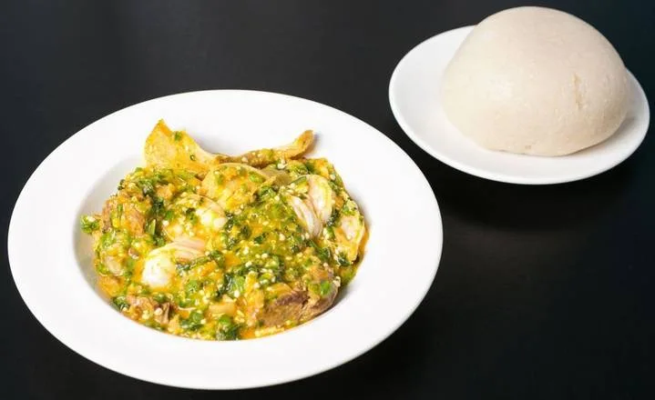Fufu with Egusi Soup at Global Pot Fusion Cuisine in Winnipeg, MB
