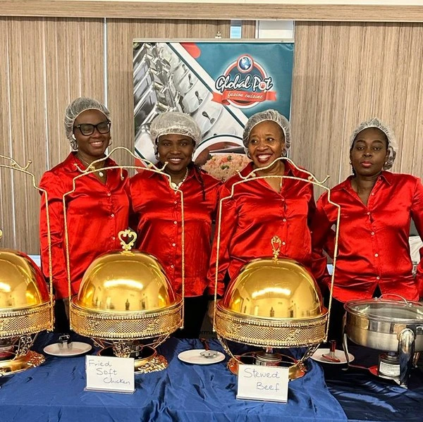 Global Pot Fusion Cuisine catering team preparing African food in Winnipeg