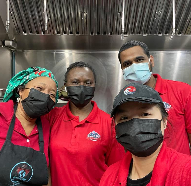 Global Pot Fusion Cuisine kitchen team in Winnipeg