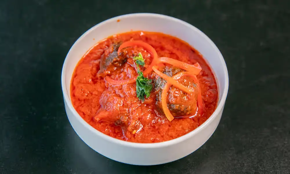 Stewed beef in tomato pepper sauce - Nigerian dish at Global Pot Fusion Cuisine Winnipeg
